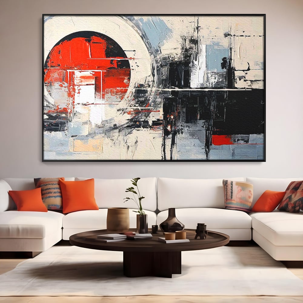 Tablou canvas cu tablou canvas cu cerc rosu si geometrie abstracta, in rama de aluminiu negru, pe perete intr-un living